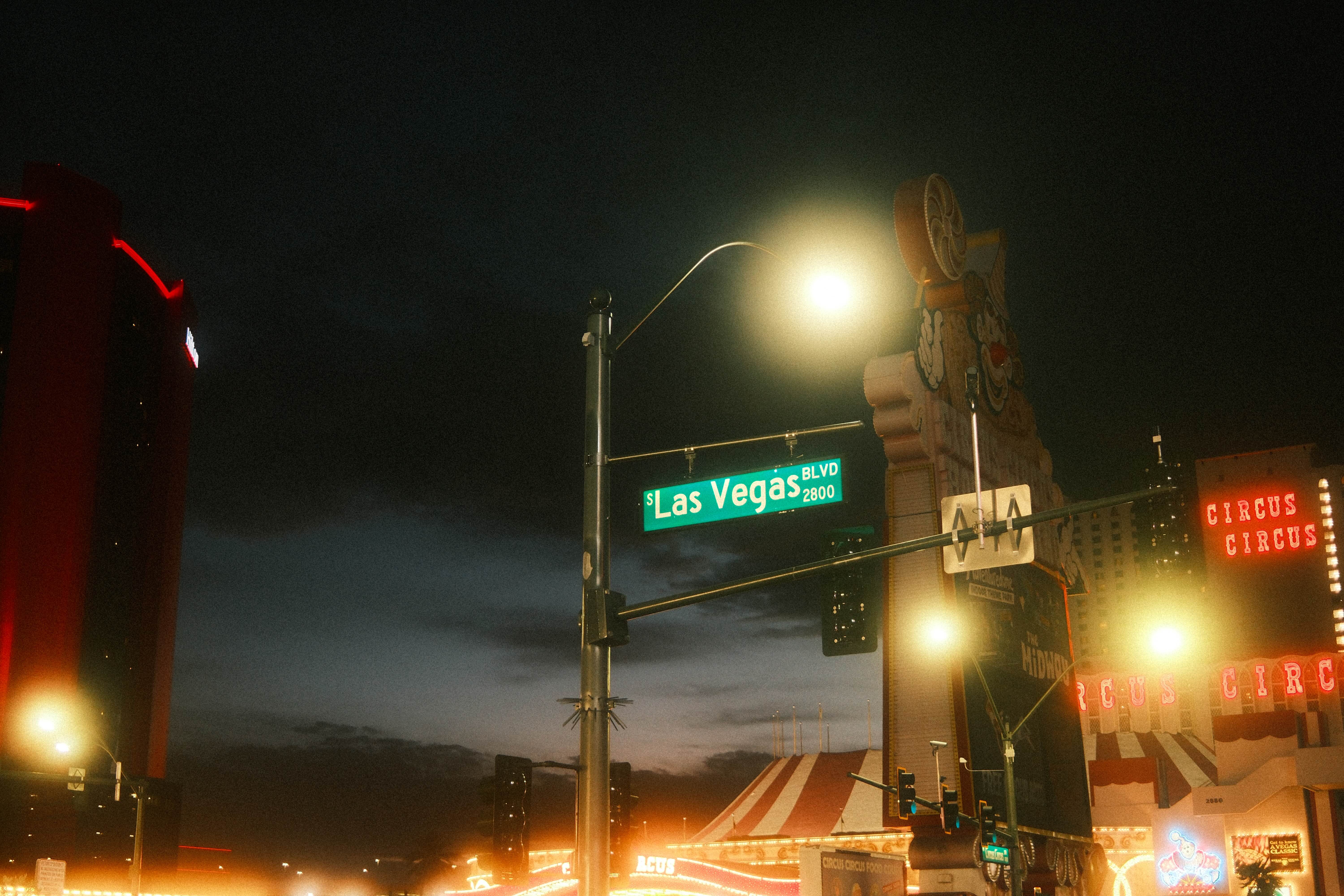 Street sign glowing at night